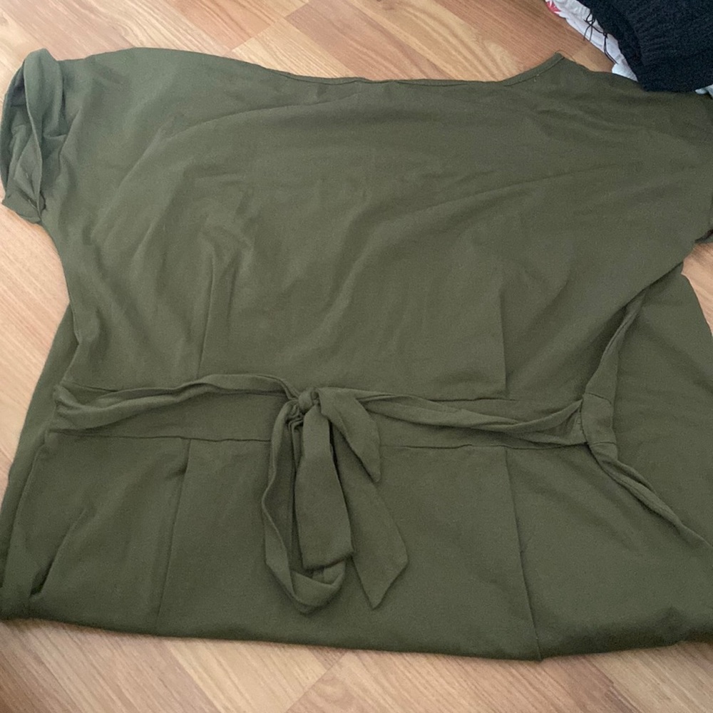 This is a midi army green dress